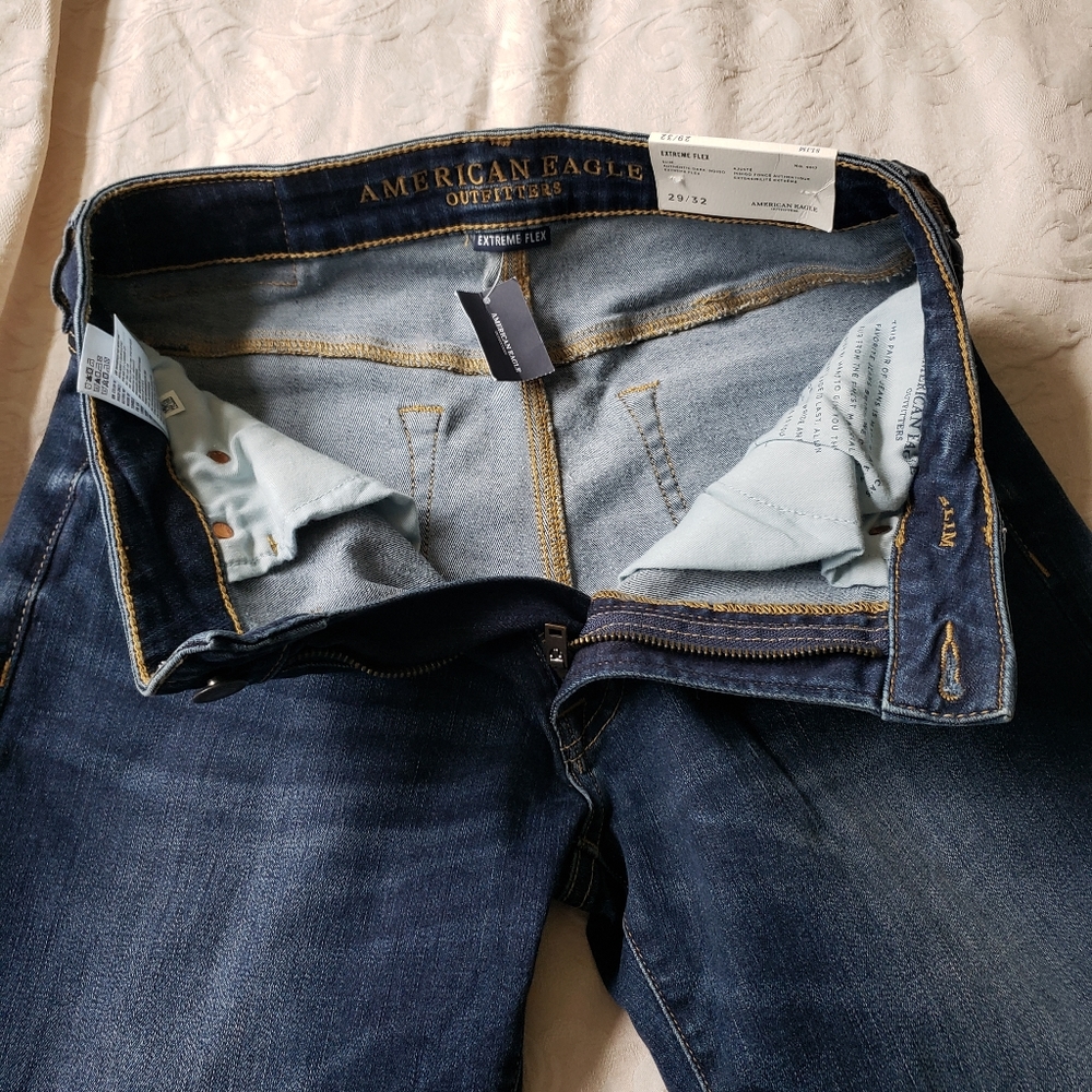 Never worn blue "extreme flex" AE denim. Slim 29/32.